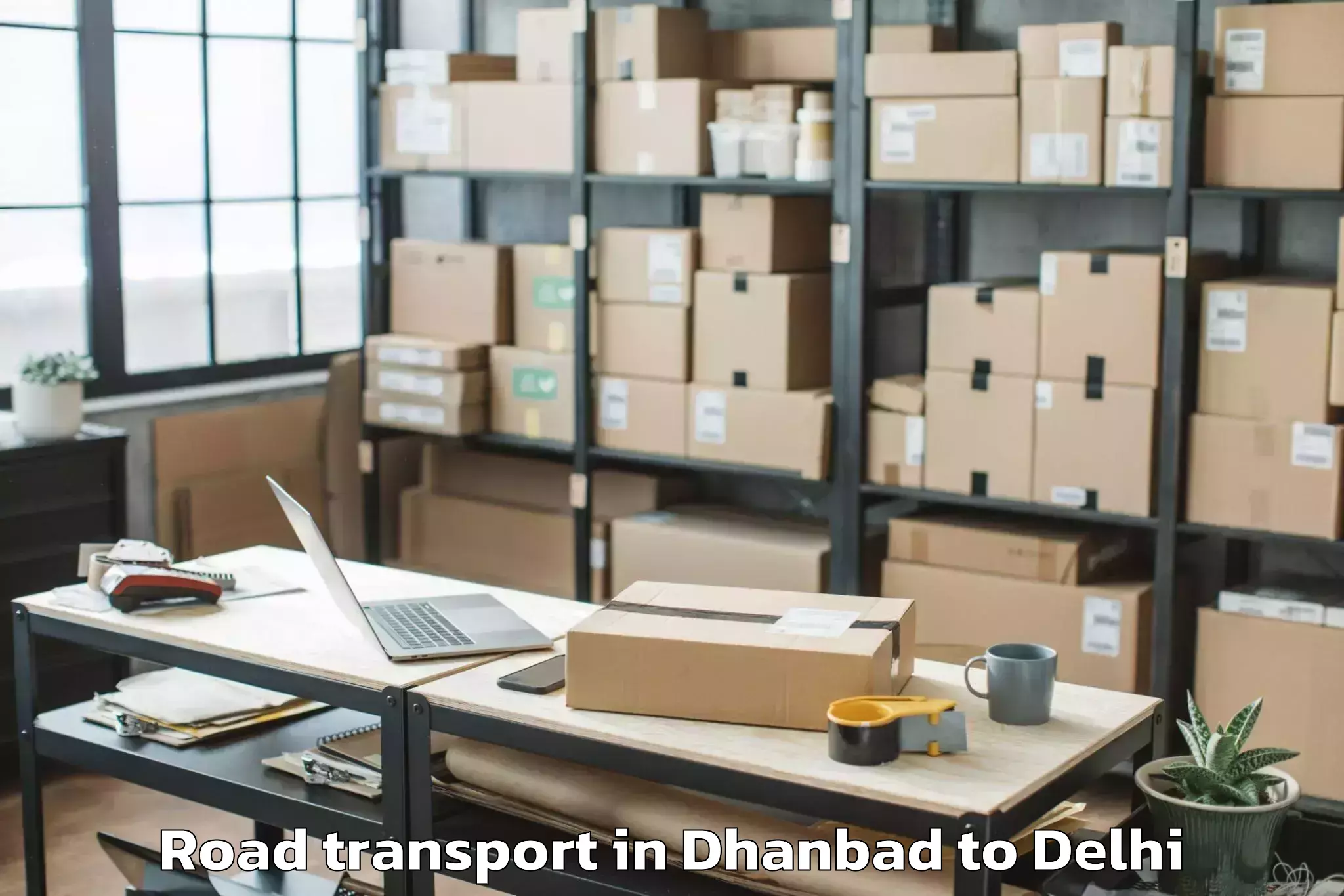 Hassle-Free Dhanbad to Naraina Industrial Estate Road Transport